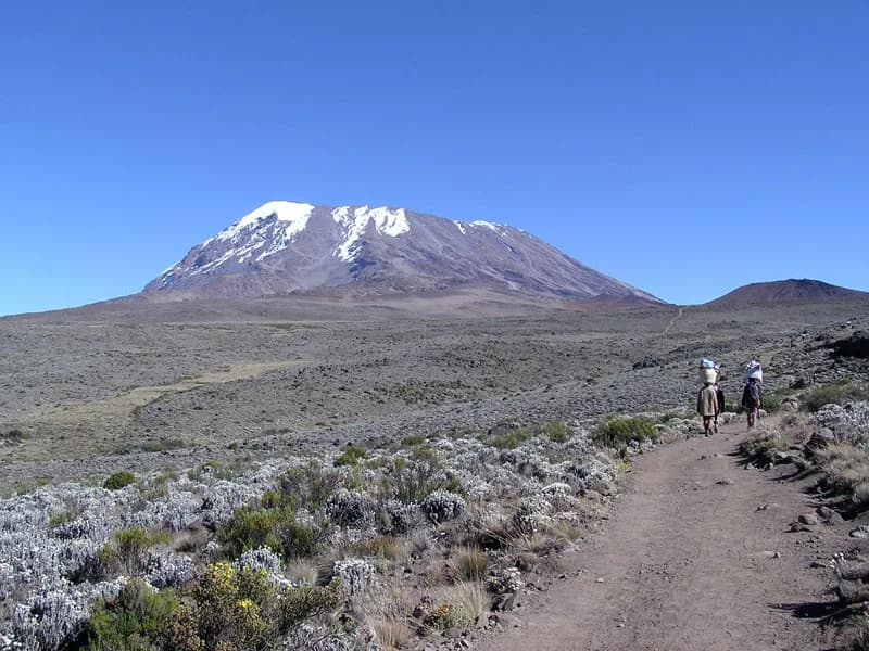 Hikers following the trail towards Kilimanjaro’s Kibo summit